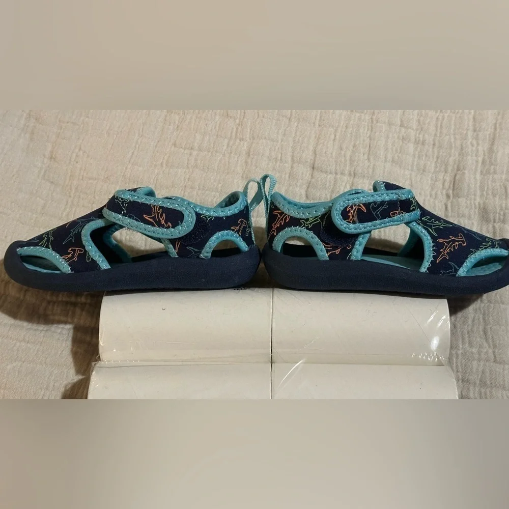 OshKosh B'gosh Kids water shoes with a shark print. Teal & black.